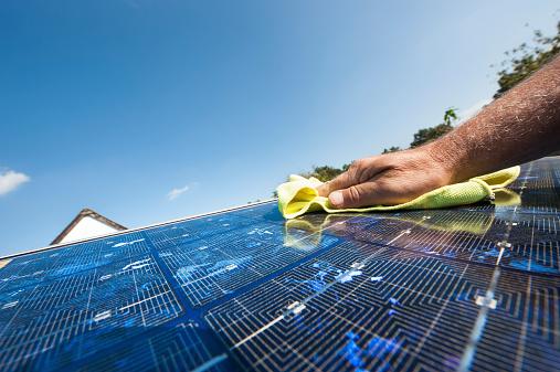 Solar panel cleaning with soft cloth